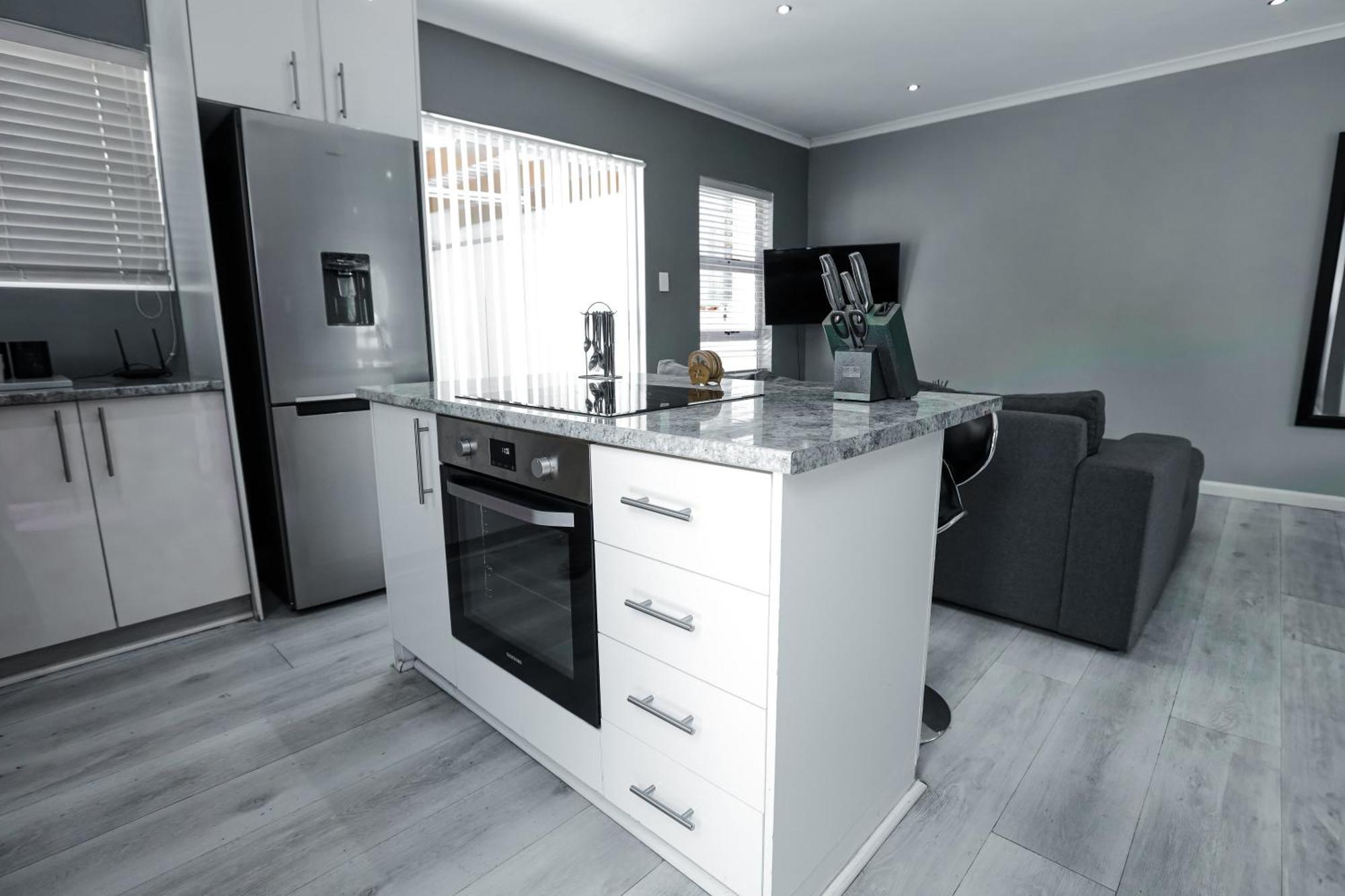 Milo's Sky Grey - No Load Shedding Apartment